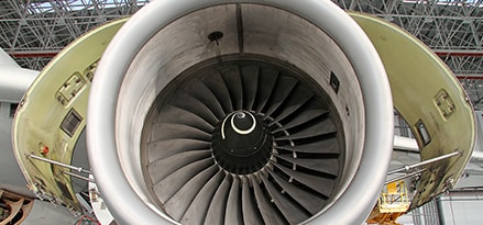 Airplane engine undergoing maintenance