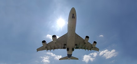 Airplane in sky undercarriage