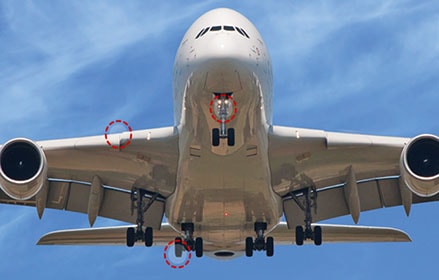 Flying airplane protected by ExxonMobil Aviation products from nose to tail