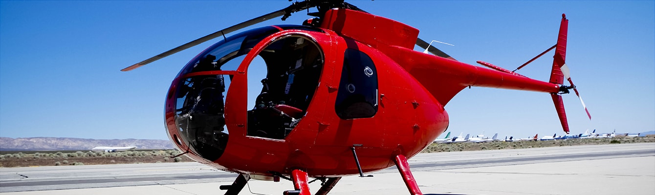 Red Helicopter on tarmac Red Helicopter on tarmac