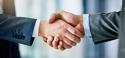 Two people shaking hands