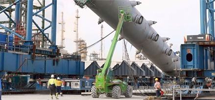 The construction crew readies a large high-pressure reactor in Singapore.
