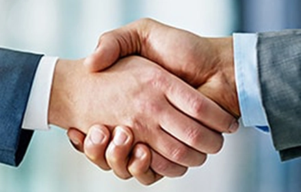 Two people shaking hands