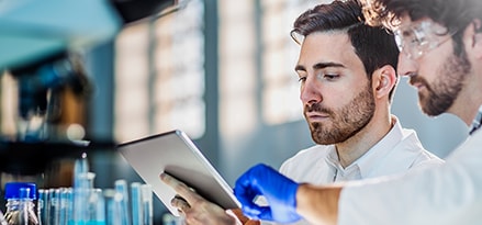 Lab Technicians with tablet