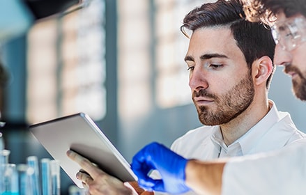 Lab Technicians with tablet