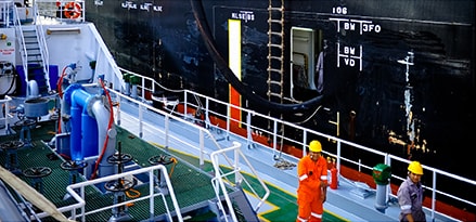 workers on a ship