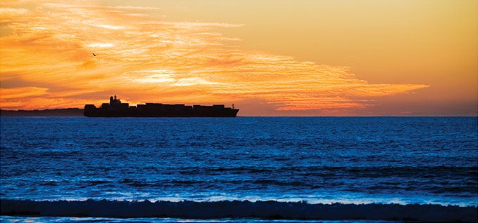Carrier ship in the sunset Marine container ship