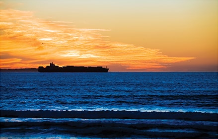 Carrier ship in the sunset