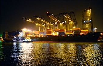 Cargo shipping port at night