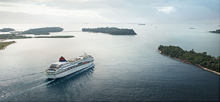 Cruise ship heading to open water