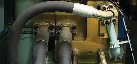 machine using hydraulic oil