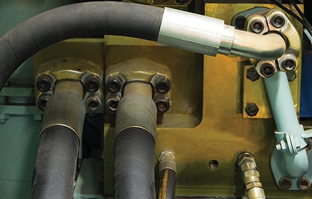 machine using hydraulic oil