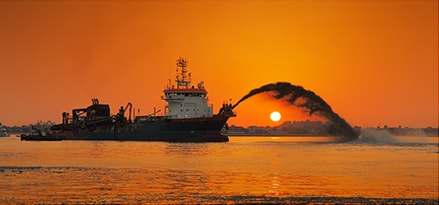 Fire fighting ship in the sunset