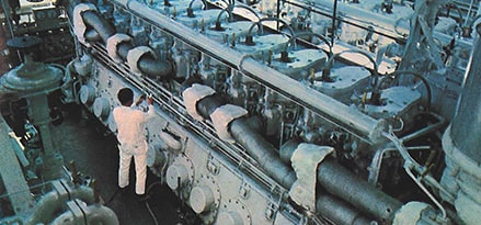 engineer inspecting machine