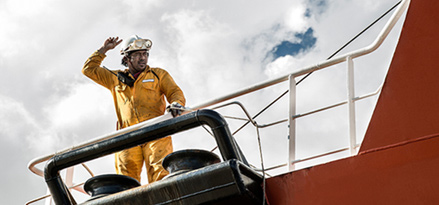 Worker mooring oil tanker