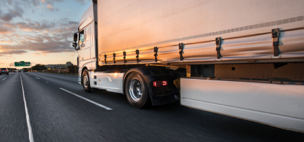 large truck on highway distributing products