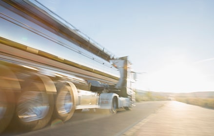 semi driving on a road